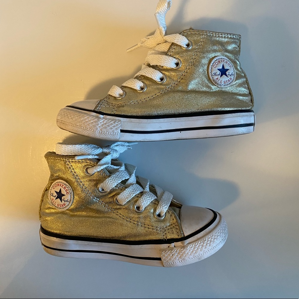 Gold high top converse